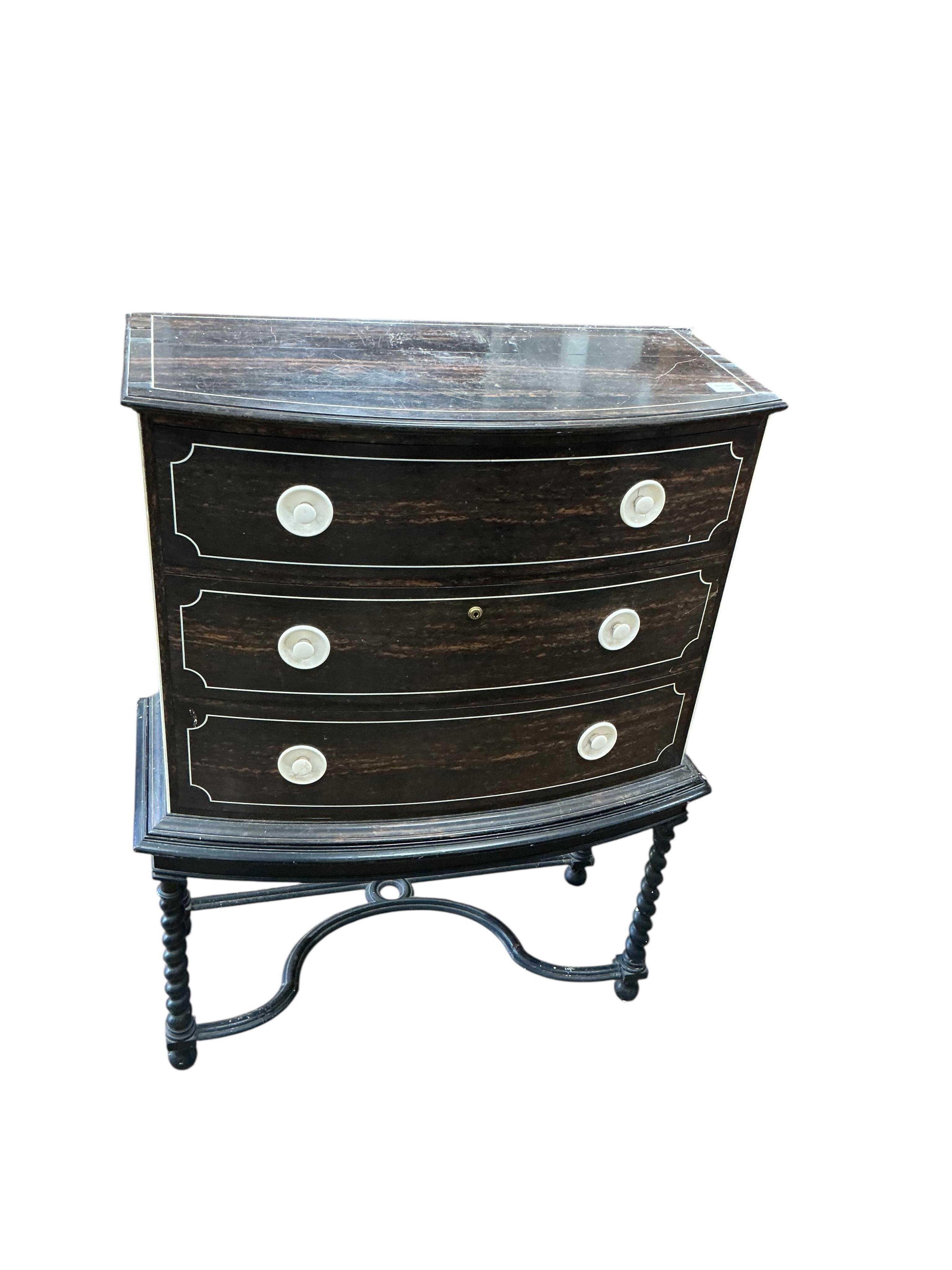 An early 20th century ivory mounted coromandel three drawer bowfront chest, stamped Callow of Mount Street, London